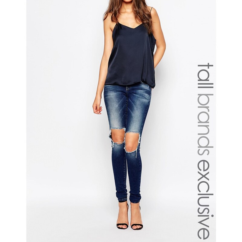 Vero Moda Tall - Five - Sehr enge Jeans mit niedrigem Bund und Zierrissen an den Knien - Blau