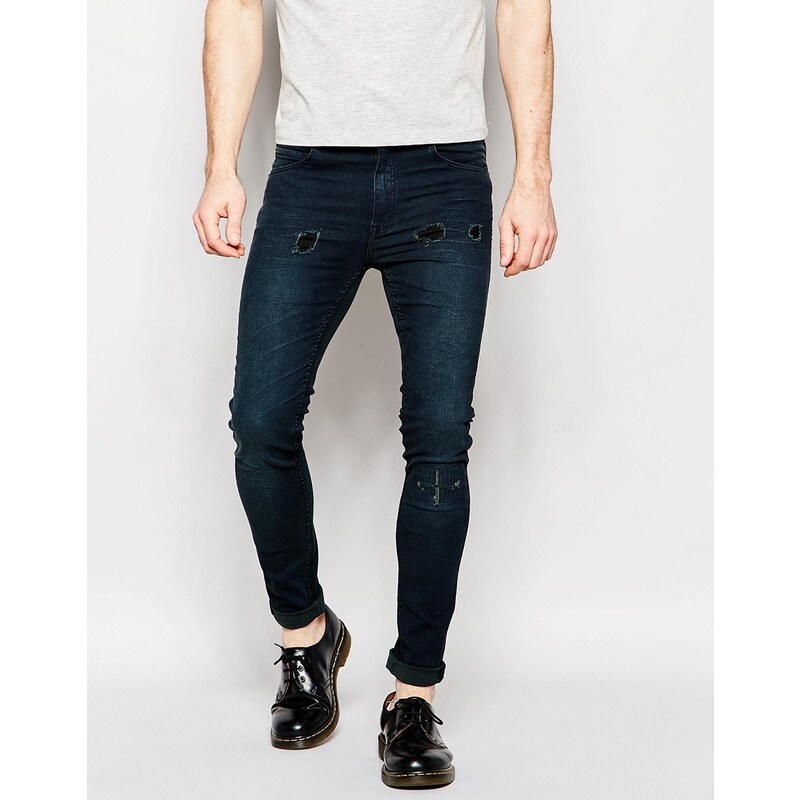 Cheap Monday - Enge Stretch-Skinny-Jeans in dunkler Smudge Trashed Repaired-Waschung - Blau