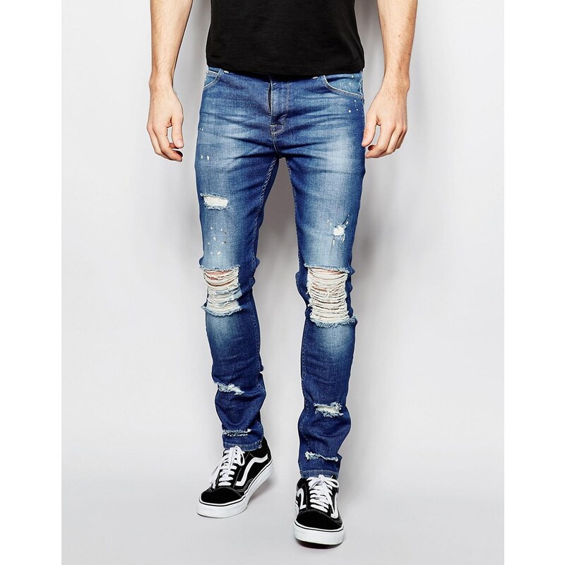ASOS - Superenge Jeans mit großen Knierissen - Blau