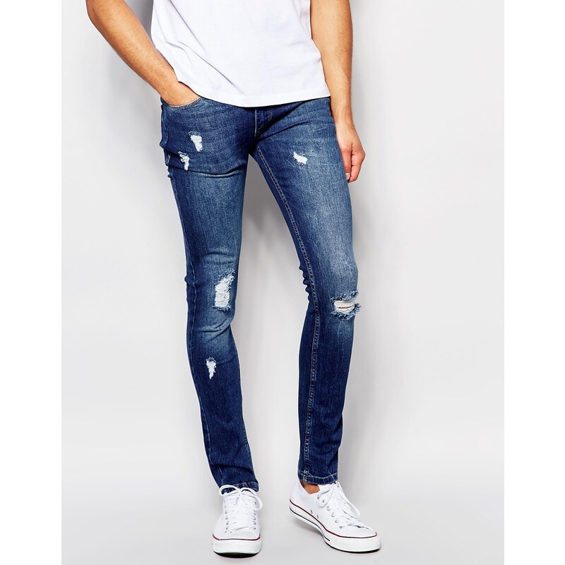 Kubban - Spray-on-Jeans in Stonewash mit Aufnäher am Bein - Blau