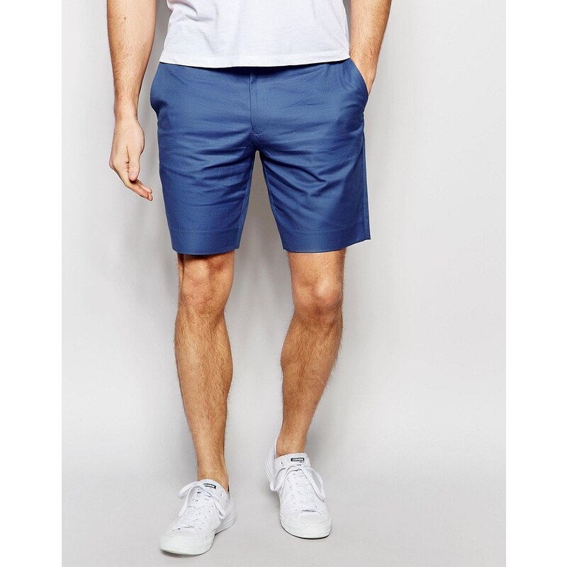 ASOS - Eng geschnittene Shorts aus Baumwolle in blauer Denimwaschung - Marineblau