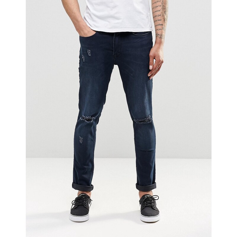 Kubban - Schmale Jeans mit Knierissen und indigoblauer Waschung - Blau
