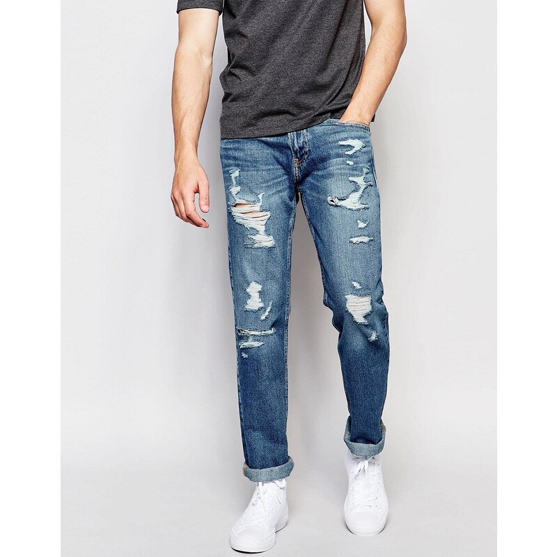 Hollister - Schmale Jeans in heller Waschung - Blau