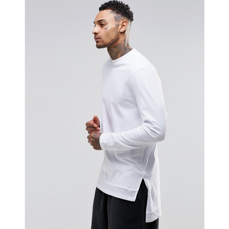 ASOS - Sehr langes, langärmliges Shirt mit gestricktem Einsatz am Saum - Weiß