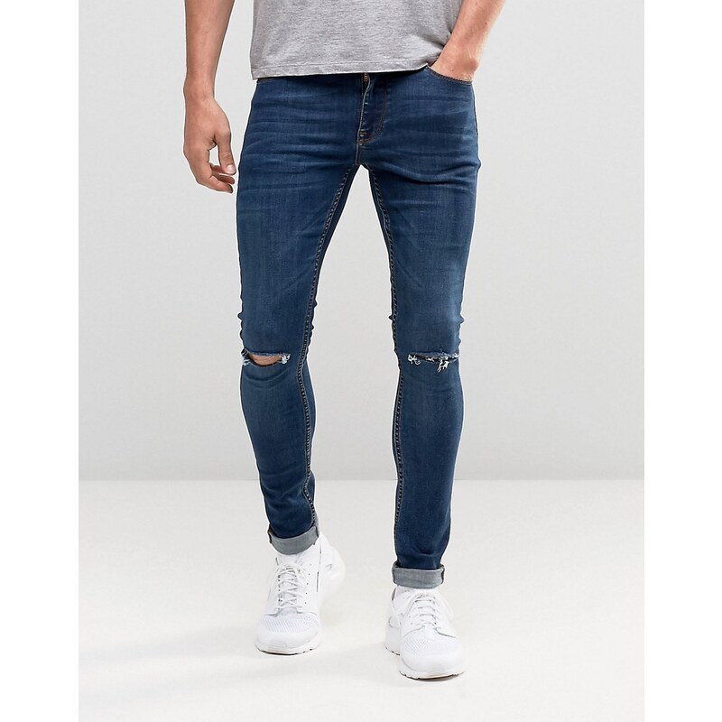 ASOS - Extrem enge Skinny-Jeans in dunkler Waschung mit Zierrissen an den Knien - Blau