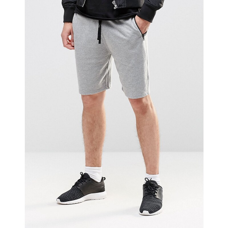 ASOS - Eng geschnittene Jersey-Shorts mit Reißverschlüssen in Kalkgrau - Grau