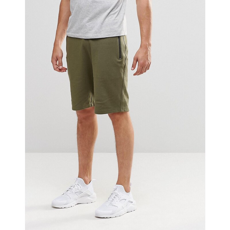 ASOS - Schmal geschnittene Jersey-Shorts mit Reißverschlüssen in Khaki - Grün