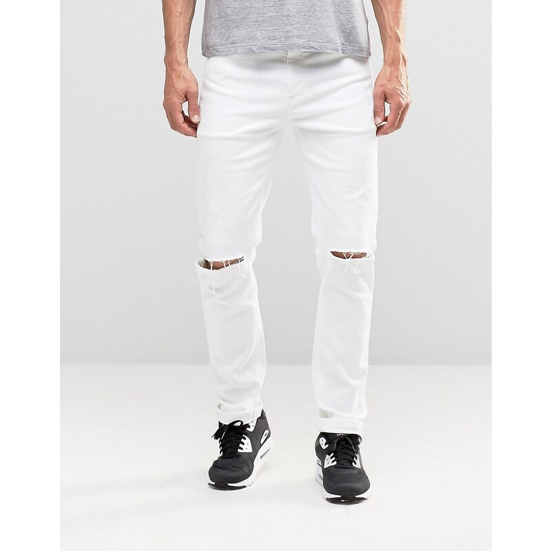 ASOS - Schmale Stretch-Jeans in Weiß mit Knierissen - Weiß