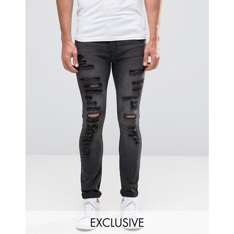 Cheap Monday - Enge Slash-Jeans mit Stretch und extremen Rissen in Base Grey - Grau