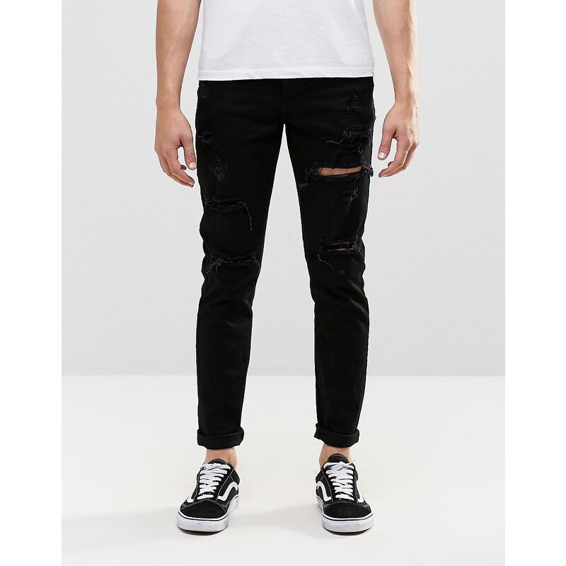 Dr Denim - Clark - Schmale Jeans in Schwarz mit zerissenen Knien und Oberschenkeln - Schwarz