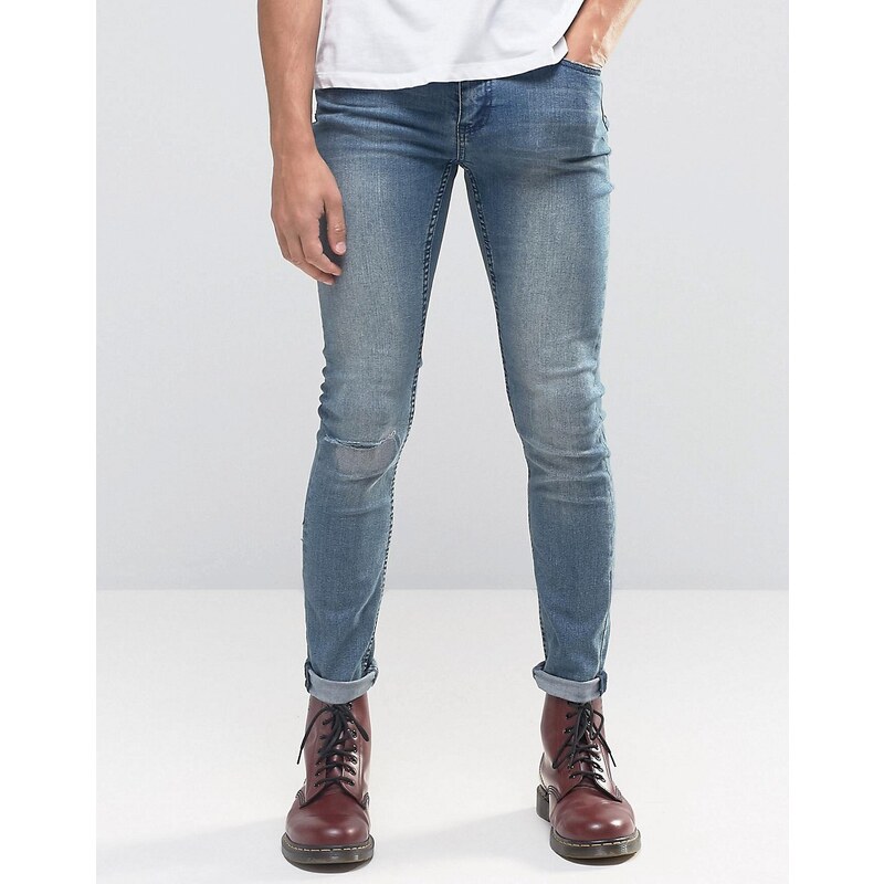 Cheap Monday - Enge Skinny-Jeans in Blau mit Zierrissen an den Knien - Blau
