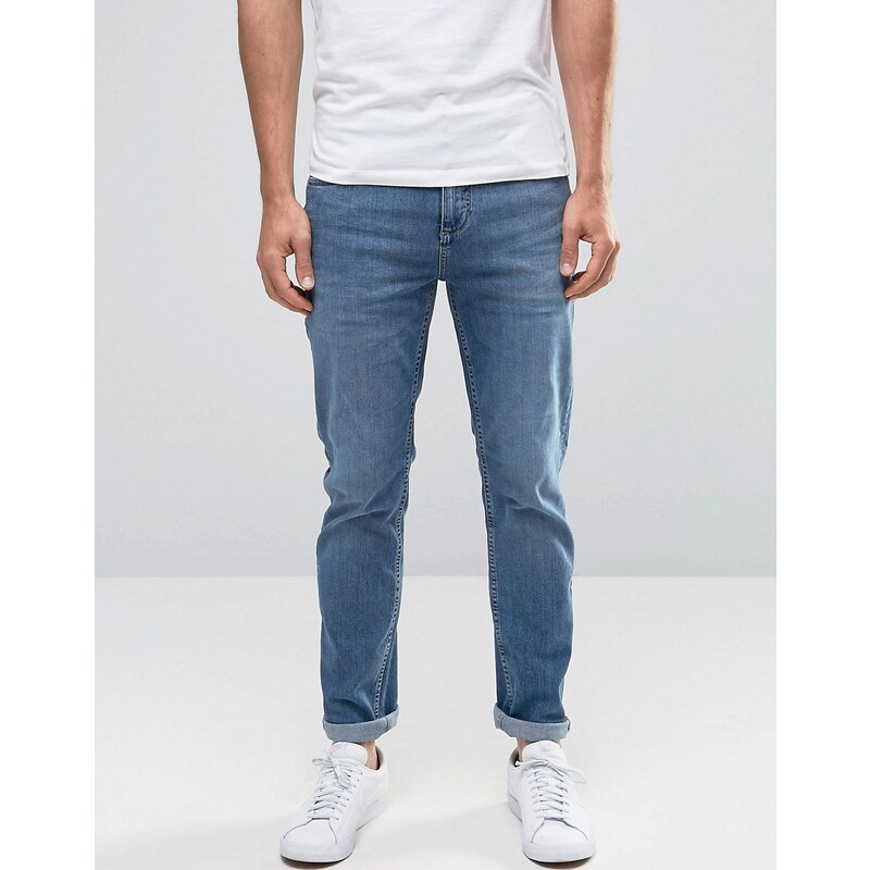 Selected Homme - Schmal geschnittene Jeans in mittlerer Waschung mit Stretchanteil - Blau
