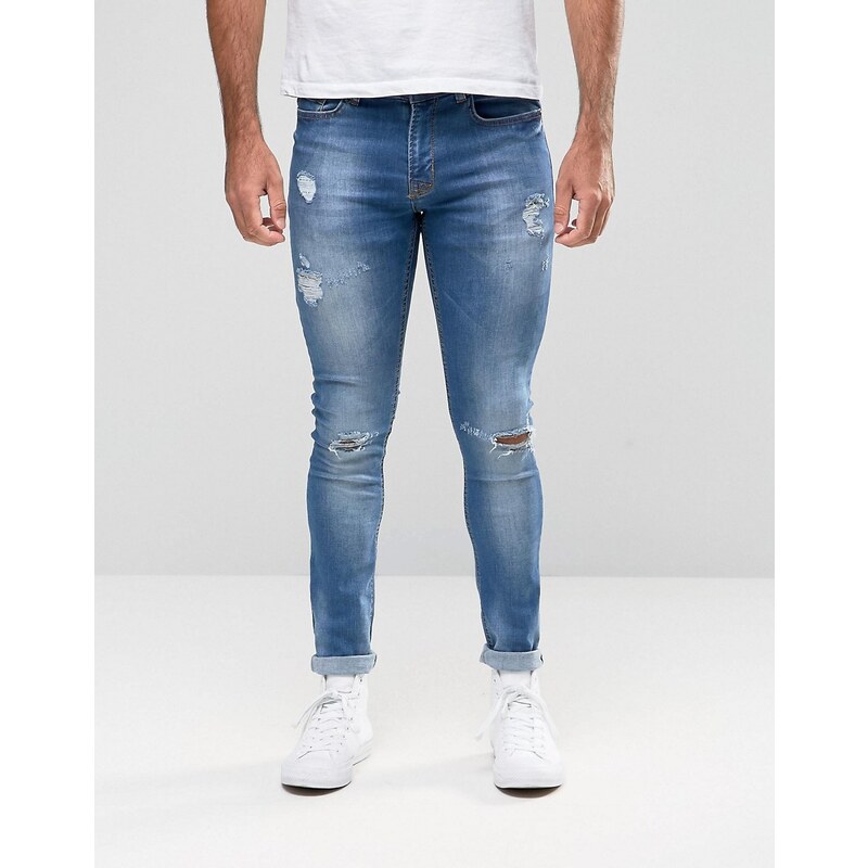 Hoxton Denim - Spray-on-Jeans in abgenutzter Optik mit Flicken - Blau